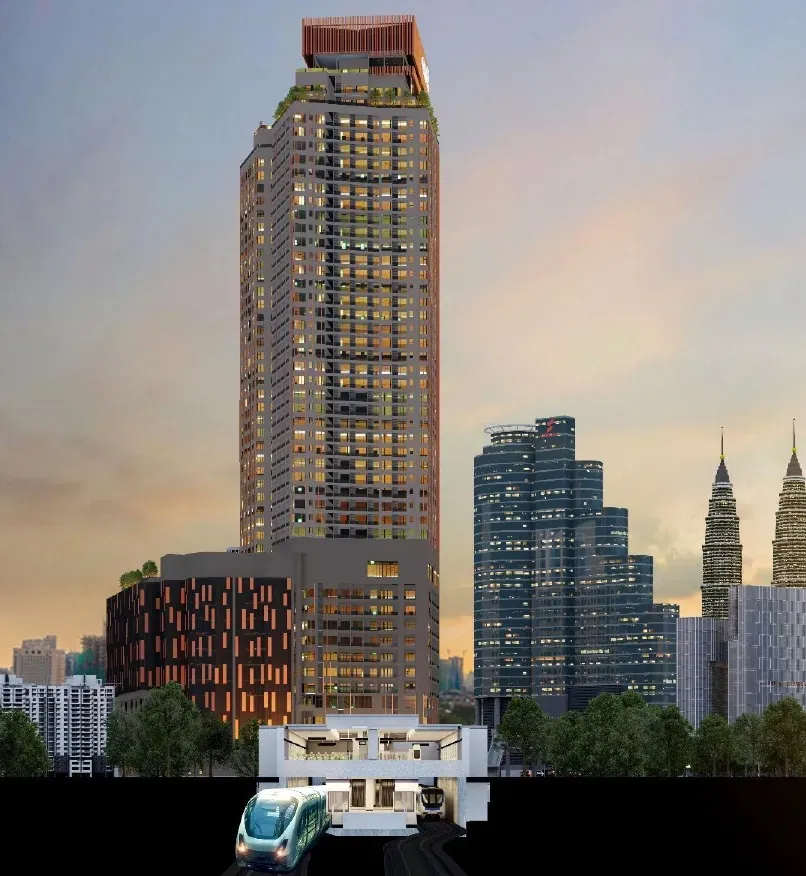 The CENTRIX tower at dusk with an LRT train passing below