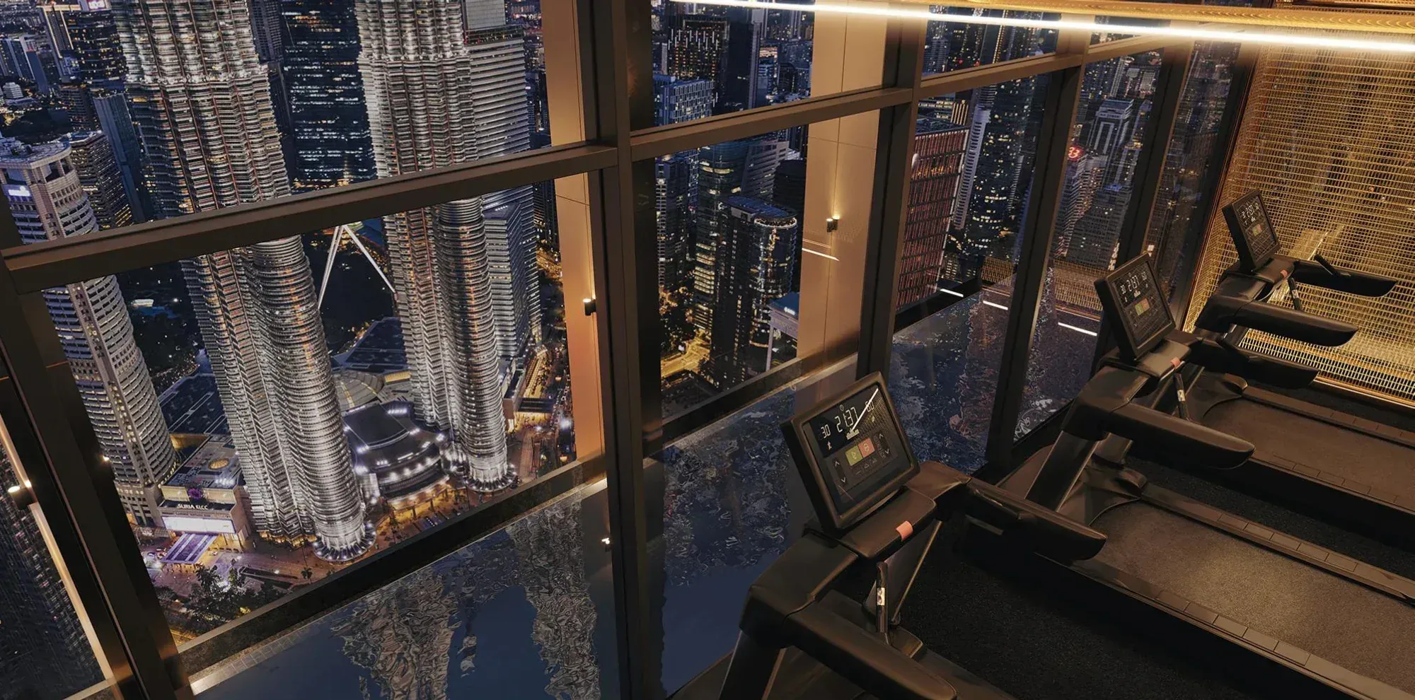 DIVINE KLCC gym overlooking the swimming pool