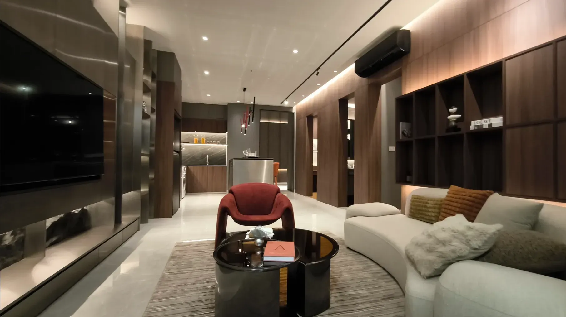 Living room with curved sofa