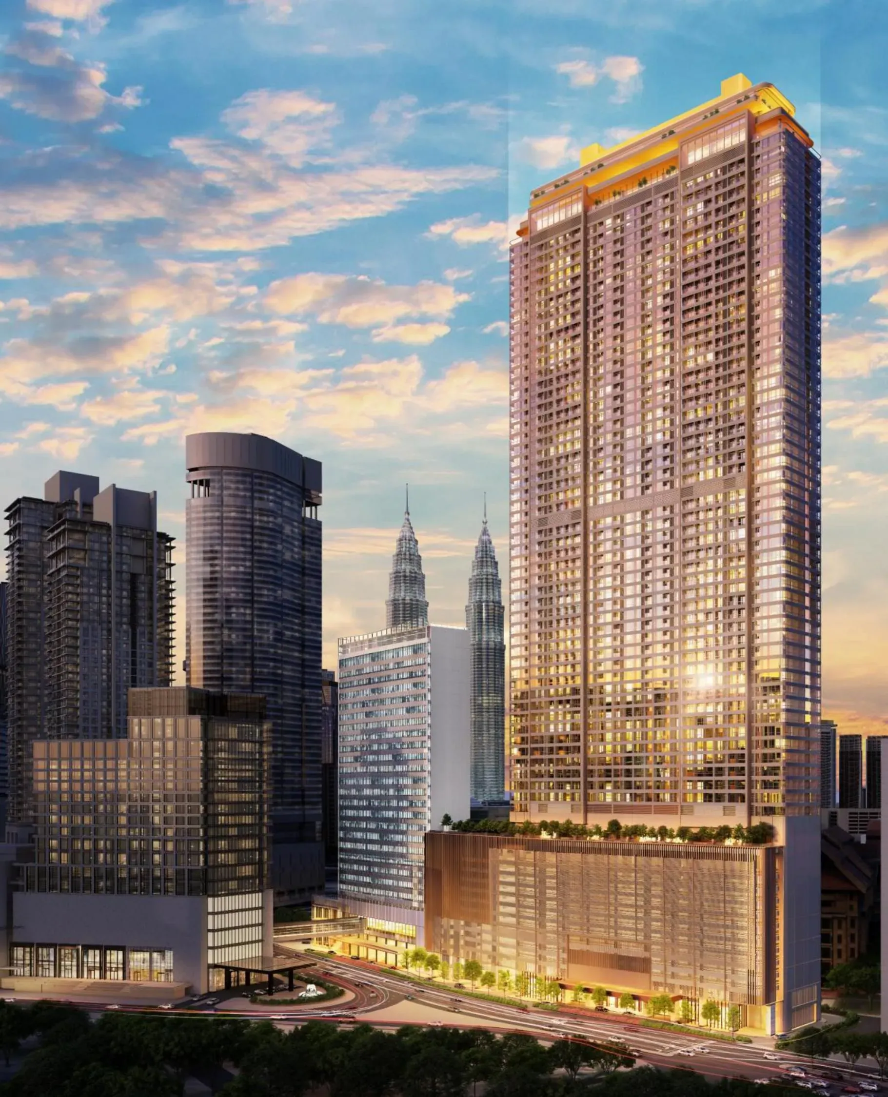 The Pavilion Square tower at dusk with the Petronas Twin Towers behind it