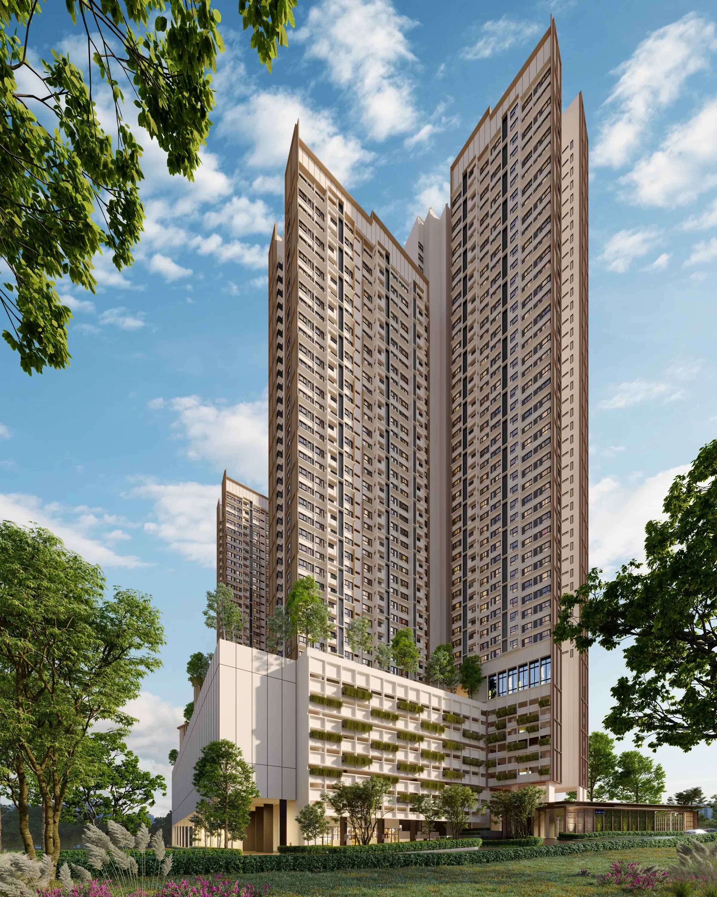 The Queenswoodz towers in Bukit Jalil against a blue sky